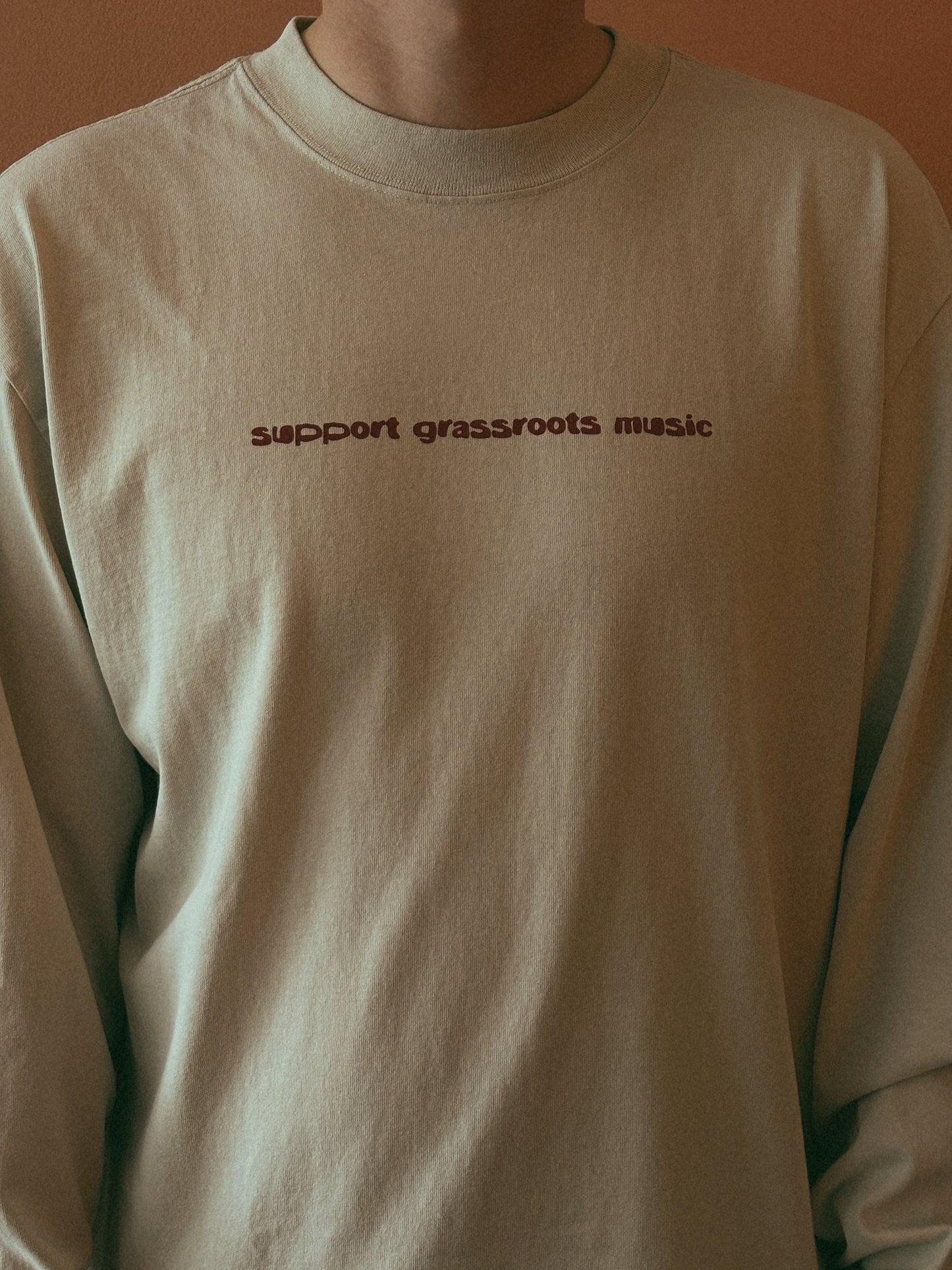 SUPPORT GRASSROOTS MUSIC JESTER LONGSLEEVE TEE